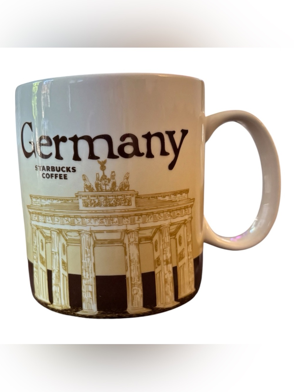 Starbucks coffee mug - Germany Cream, Brown and Gold Ceramic City Mug 2010